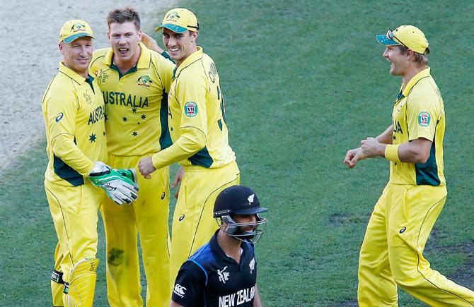 Australia's James Faulkner exchanges words with New Zealand's Grant Elliot after dismmissing him