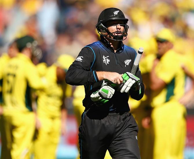  Martin Guptill of New Zealand walks 