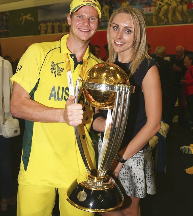 Steve Smith of Australia and his partner Dani Willis pose with the trophy
