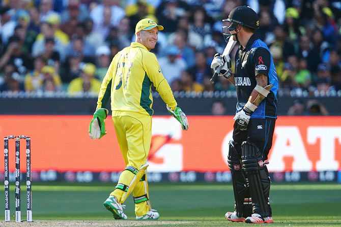 Brad Haddin of Australia smiles as he walks past Luke Ronchi of New Zealand during the 2015 ICC Cricket World Cup final at Melbourne Cricket Ground on Sunday