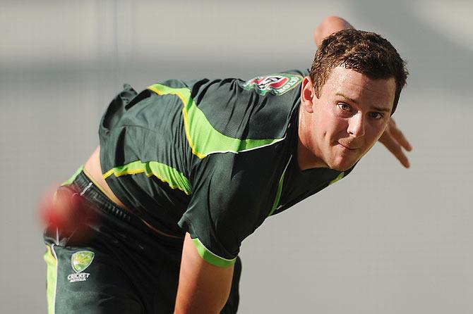 Josh Hazlewood bowls during an Australian training session