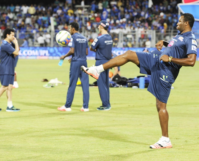 Mumbai Indians player Kieron Pollard warms up