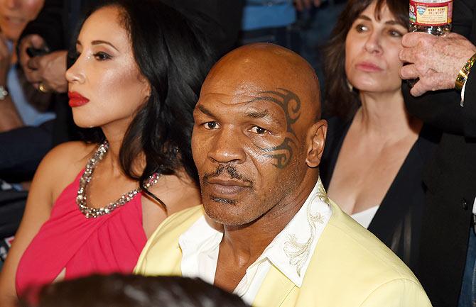 Mike Tyson shakes hands ringside At 'Mayweather VS Pacquiao' presented by SHOWTIME PPV And HBO PPV at MGM Grand Garden Arena on Saturday