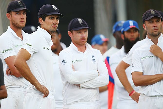England captain Alastair Cook (2nd from left) and teammates Stuart Broad (left), Ian Bell (centre) and Jonathan Trott look on at the after match presentations as the series was squared 1-1 after West Indies won the 3rd Test match by five wickets on Day 3 at Kensington Oval in Bridgetown, Barbados, on Sunday