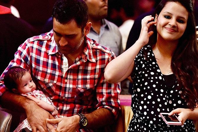 Mahendra Singh Dhohi with wife Sakshi and daughter Ziva at the launch of Dwayne Bravo's single on Sunday