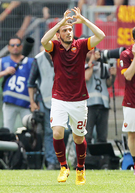 Alessandro Florenzi of AS Roma celebrates after scoring the team's second goal against Genoa during their Serie A match at Stadio Olimpico in Rome on Sunday