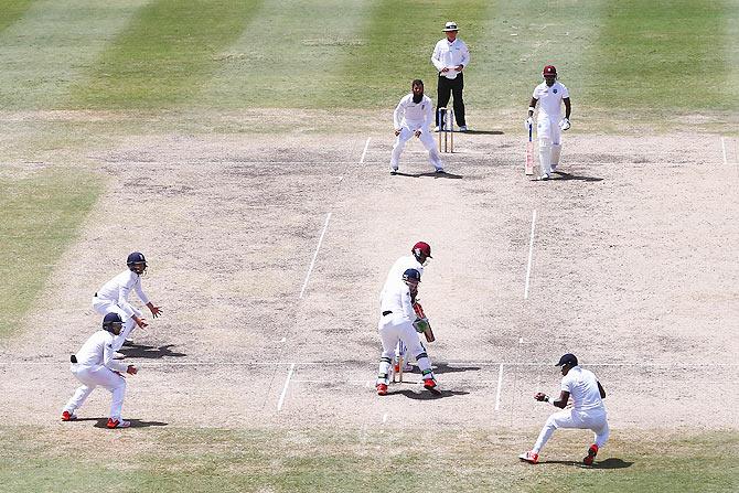 England's Chris Jordan (right) catches West Indies' Kraigg Brathwaite at first slip off the bowling of Moeen Ali