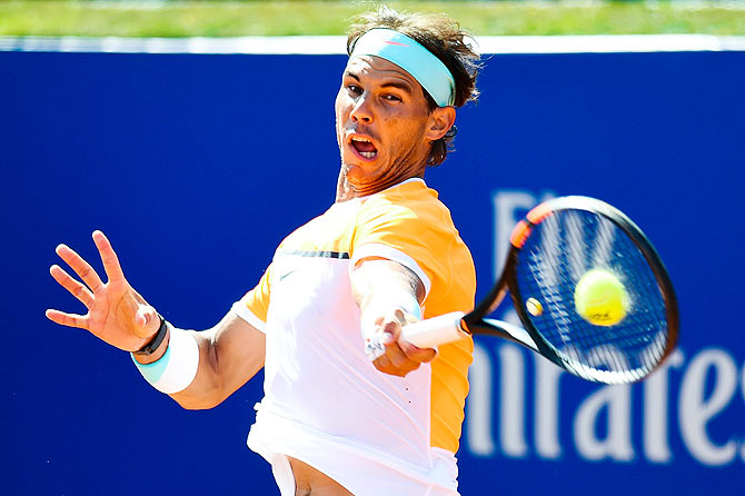 Rafael Nadal of Spain in action against Fabio Fognini of Italy during day four of the Barcelona Open Bac Sabadell at the Real Club de Tenis Barcelona on April 23, 2015. Fabio Fognini had won that match 6-4, 7-6