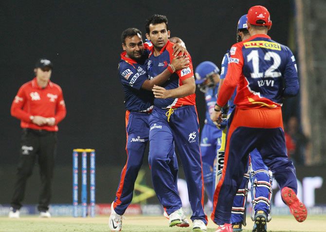Delhi Daredevils' Zaheer Khan celebrates the wicket of Mumbai Indians' Lendl Simmons