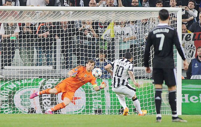 Juventus' Carlos Tevez scores their second and winning goal from the penalty spot during the Champions League final against Real Madrid at the Juventus Stadium in Turin on Tuesday