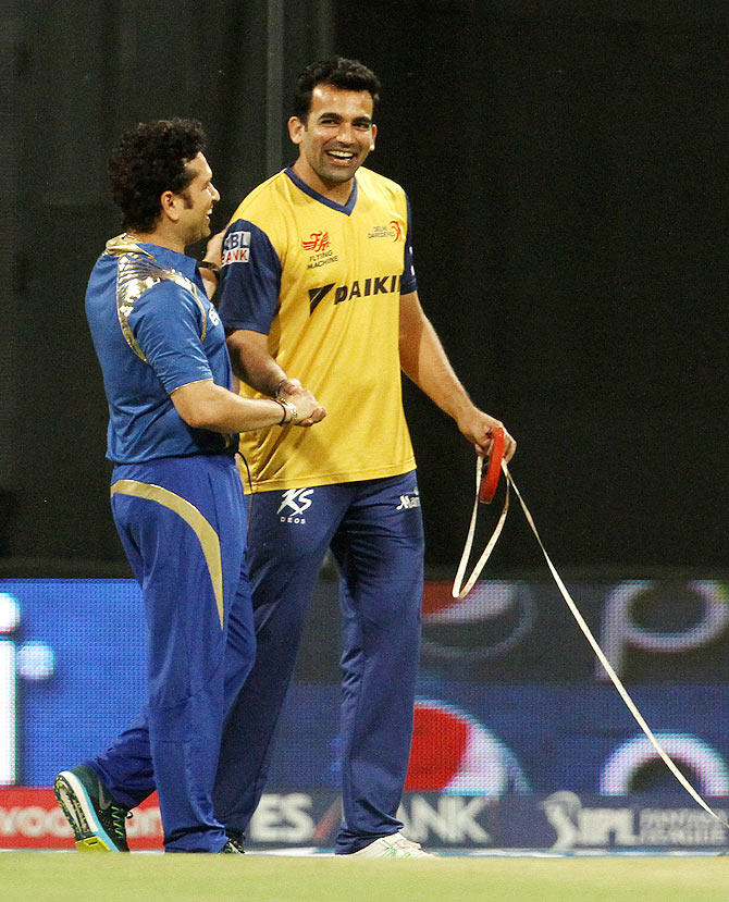 Mumbai Indians' Sachin Tendulkar and Delhi Daredevils' Zaheer Khan share a laugh