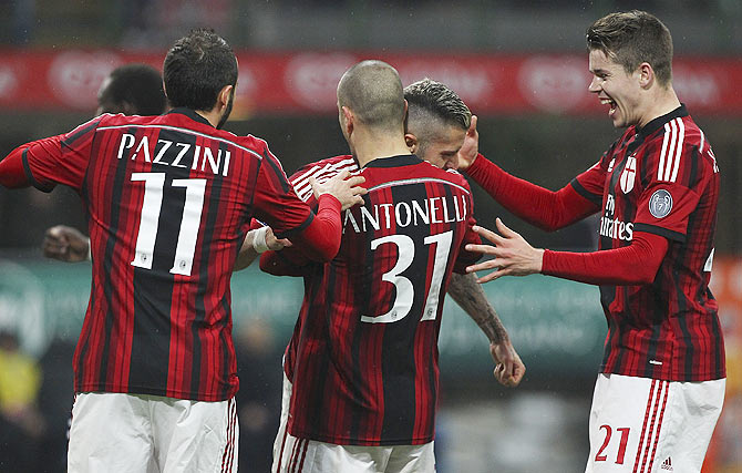 AC Milan players celebrate