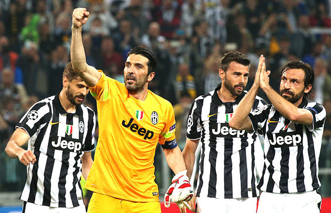 Juventus' Fernando Llorente, Gianluigi Buffon, Andrea Barzagli and Andrea Pirlo celebrate