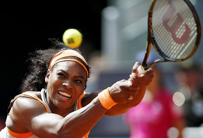 Serena Williams of the US returns the ball to Victoria Azarenka of Belarus