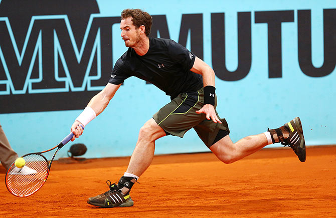 Great Britain's Andy Murray runs to play a forehand against Spain's Marcel Granollers in their third round match on Thursday