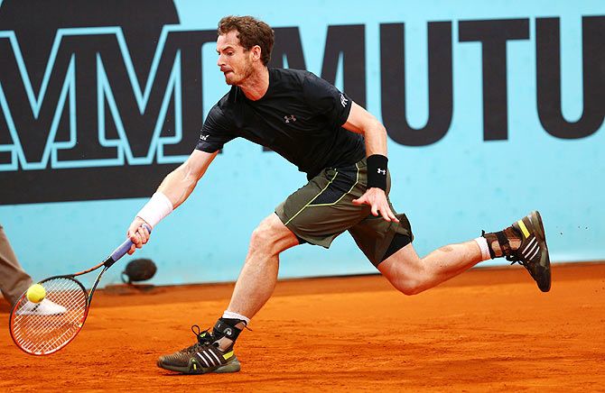 Great Britain's Andy Murray runs to play a forehand against Spain's Marcel Granollers in their third round match on Thursday