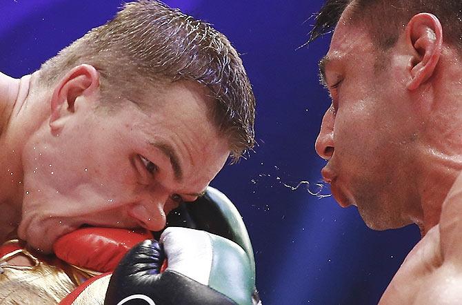 Felix Sturm of Germany (right) and Fedor Chudinov of Russia fight during their super-middleweight WBA world championship title fight in Frankfurt, Germany, on May 9