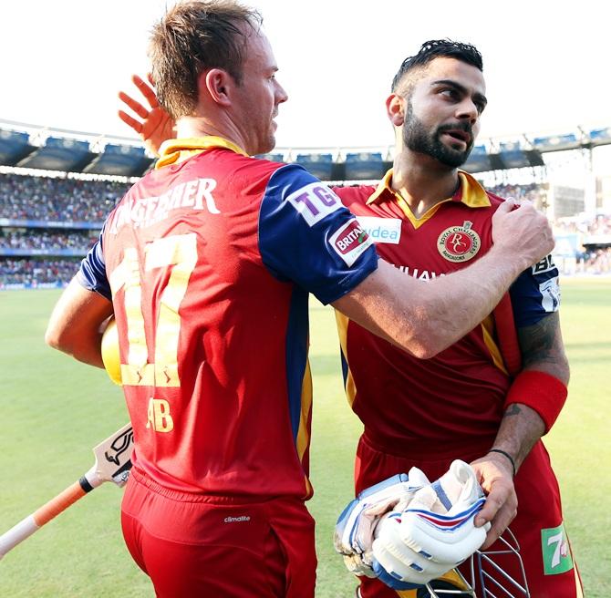 Royal Challengers Bangalore captain Virat Kohli hugs AB De Villiers 