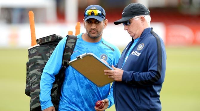 India captain Mahendra Singh Dhoni (left) with coach Duncan Fletcher