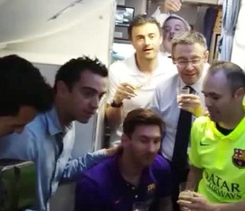 A video grab of Barca coach Luis Enrique celebrates with club president Bartomeu and players Xavi Hernandez (left), Lionel Messi and Andres Iniesta
