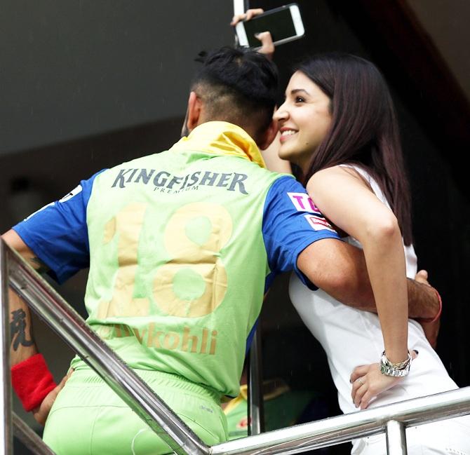 Virat Kohli chats with his girlfriend Anushka Sharma