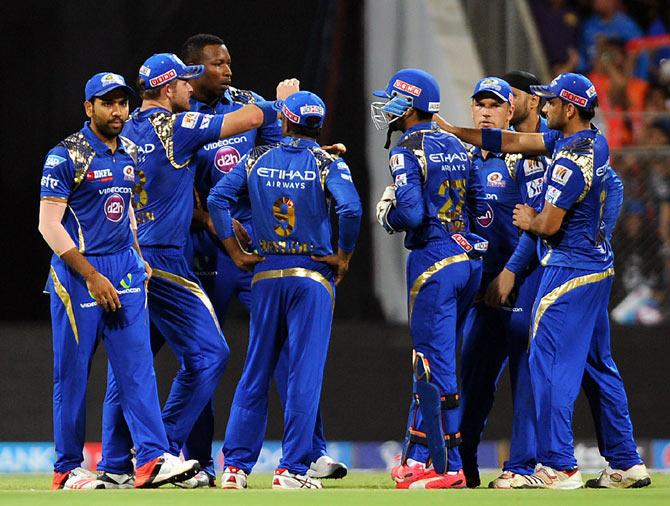 Mumbai Indians players celebrate a wicket