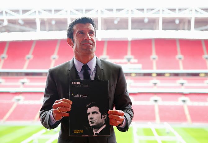 Luis Figo poses at the launch of his FIFA Presidential Campaign Manifesto at Wembley Stadium in London on February 19, 2015