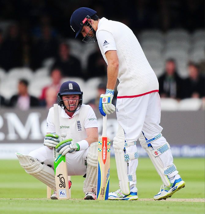 England captain Alistair Cook checks on teammate Ian Bell after he took a low blow on Day 3 of the 1st Test Match against New Zealand at Lord's Cricket Ground London on Saturday