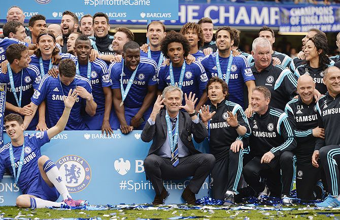 Chelsea manager Jose Mourinho (centre) celebrates after winning the English Premier League