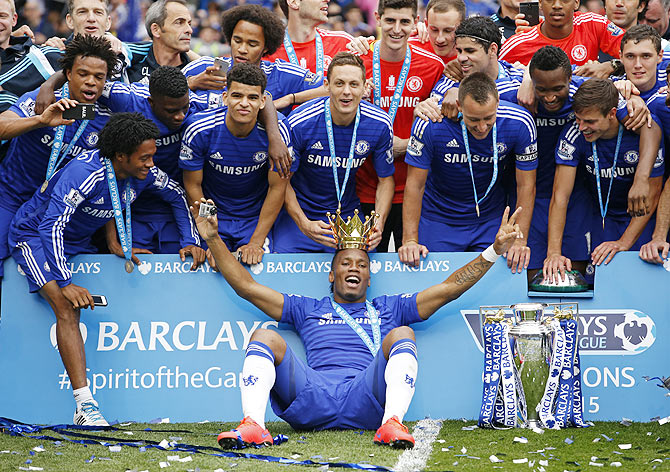 Chelsea celebrate with the trophy after winning the Barclays Premier League