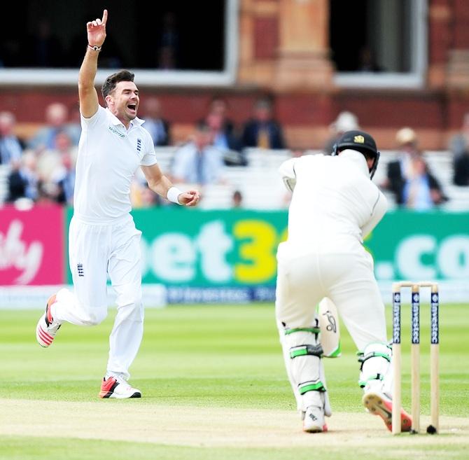 James Anderson of England celebrates taking the wicket of Martin Guptill