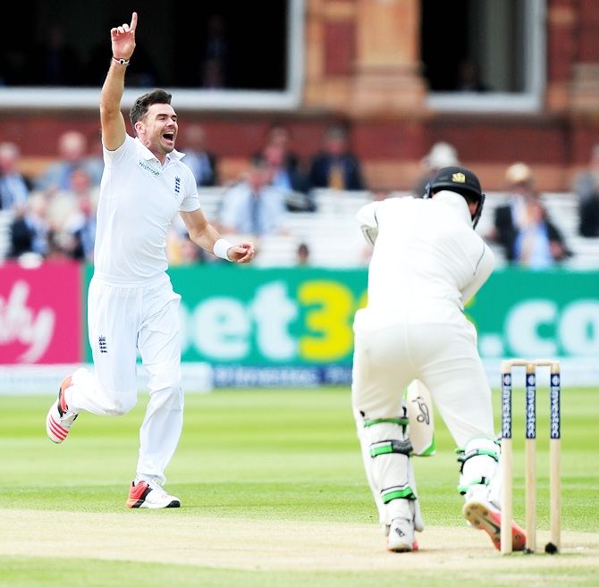 James Anderson of England celebrates taking the wicket of Martin Guptill