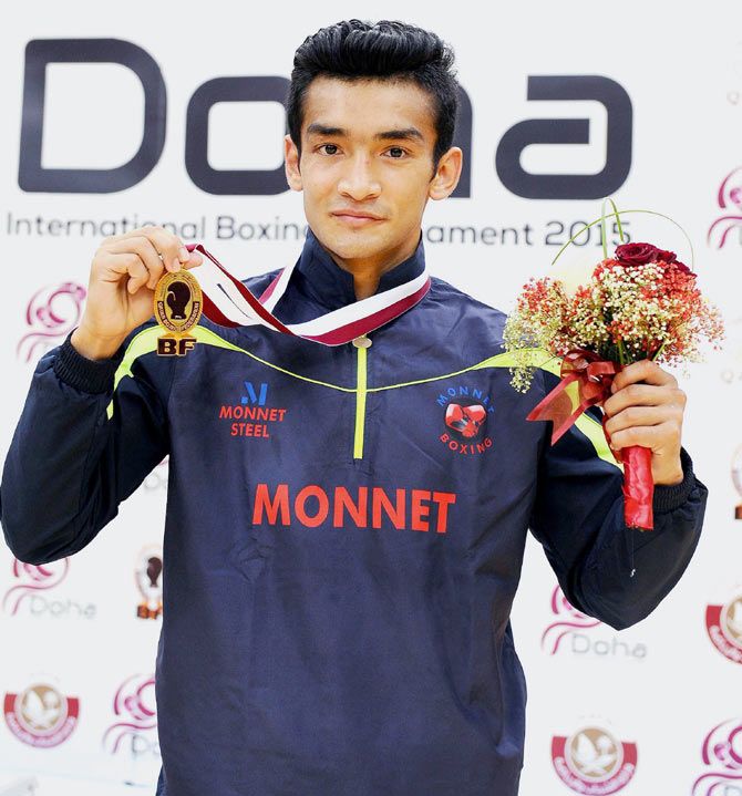 Indian boxer Shiva Thapa showing his gold medal (56kg weight category) during the International Boxing Tournament 2015 organized by Qatar Boxing Federation, at Doha in Qatar on Saturday