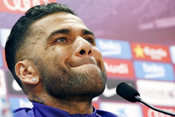 Barcelona's Dani Alves at a press conference on Monday