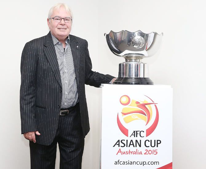 Les Murray poses with the Asian Cup Trophy