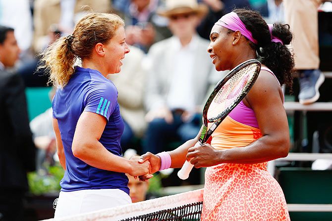 Germany's Anna-Lena Friedsam (left) congratulates Serena Williams of the United States