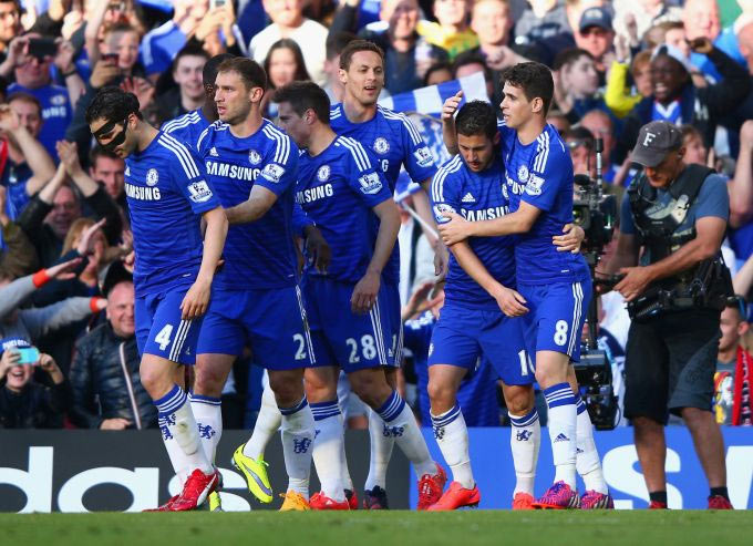 Chelsea players celebrate after scoring a goal