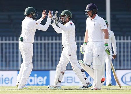 England's Ian Bell walks off dejected after being stumped by Pakistan's Sarfraz Ahmed on Day 2 of the 3rd Test  at Sharjah Cricket Stadium, in the United Arab Emirates on Monday