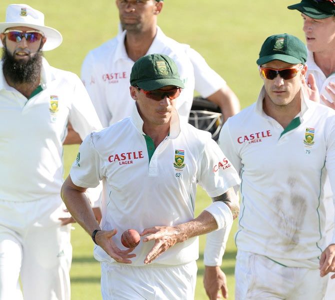 Dale Steyn leads the South African team out of the field