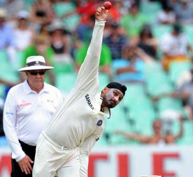 Harbhajan Singh bowls