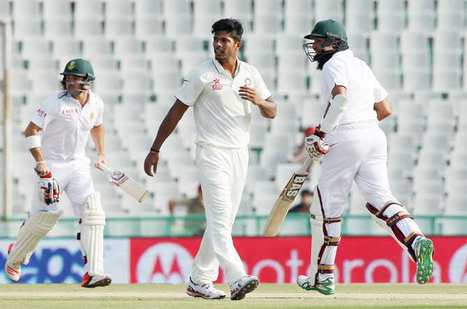 India's Umesh Yadav walks back  