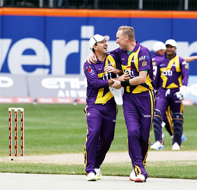 Ricky Ponting and Allan Donald share a light moment during the match