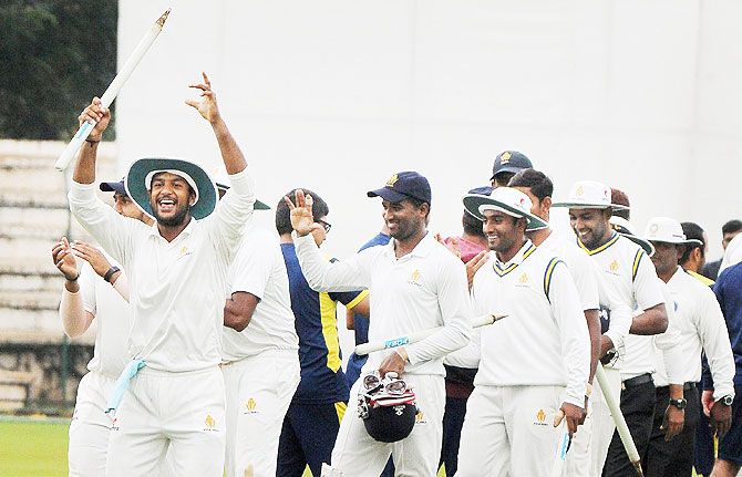 Karnataka Ranji team players celebrating after defeating Odisha by innings & 64 runs in Mysore on Tuesday
