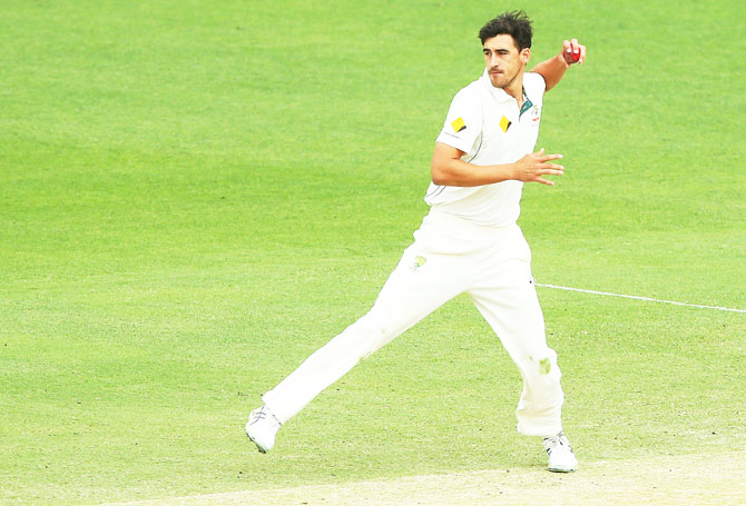 Australia's Mitchell Starc throws the ball during day five of the first Test against New Zealand at The Gabba in Brisbane on Monday