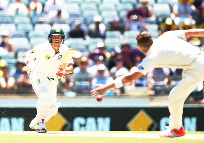 David Warner plays a shot past New Zealand's Tim Southee