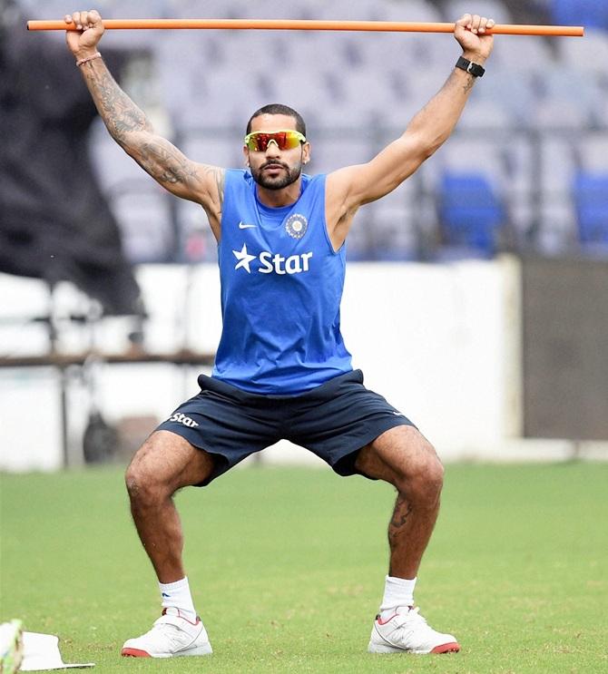 Shikhar Dhawan goes through a drill