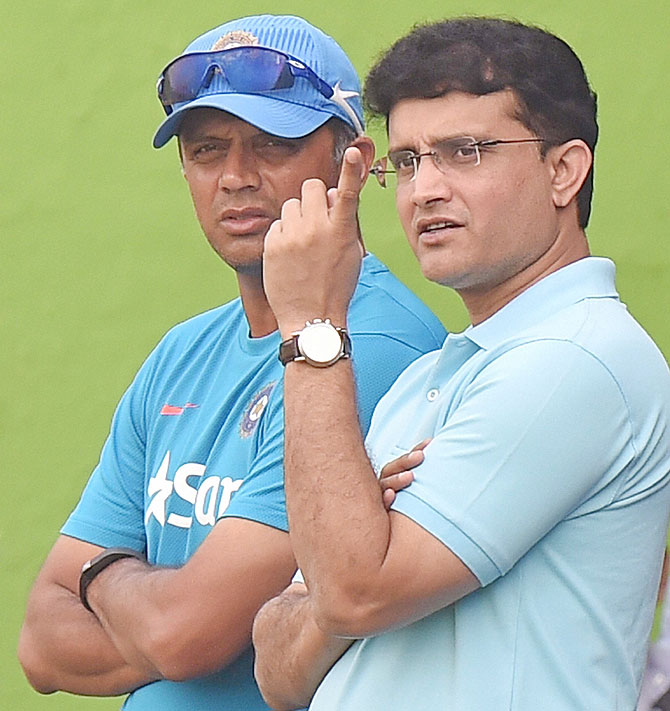 Former India captain and CAB President Sourav Ganguly and Indian U-19 coach Rahul Dravid during Under-19 Triseries one-day match between India vs Afghanistan at Salt Lake in Kolkata on Friday