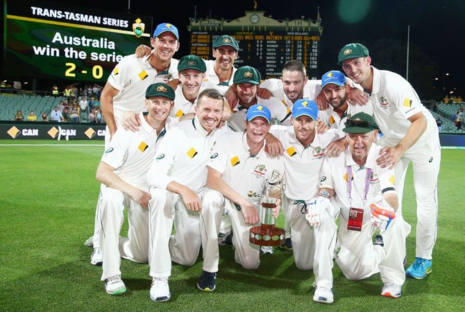 The Australian team pose with the Trans-Tasman trophy after beating New Zealand and winning the series 2-0 on Sunday