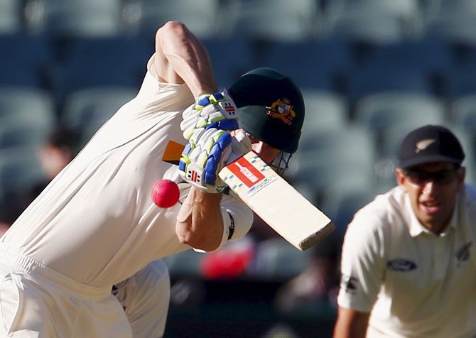 New Zealand's Ross Taylor watches Australia's Shaun Marsh hit a boundary on Day 3 of the first day-night Test at the Adelaide Oval, November 30, 2015. Photograph: David Gray/Reuters