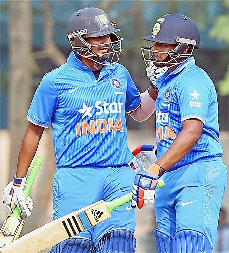 India U-19 cricketer Sarfaraz Khan celebrates with captain Ricky Bhui after completing his 50 during U-19 Tri Series final against Bangladesh at Salt Lake in Kolkata on Sunday